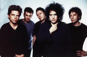 By the '90s, Robert Smith should have probably started looking into a different look...