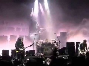 I couldn't find a good screenshot of The Cure playing Saturday Night Live, so this is a photo of them playing "10:15 Saturday Night" live instead.